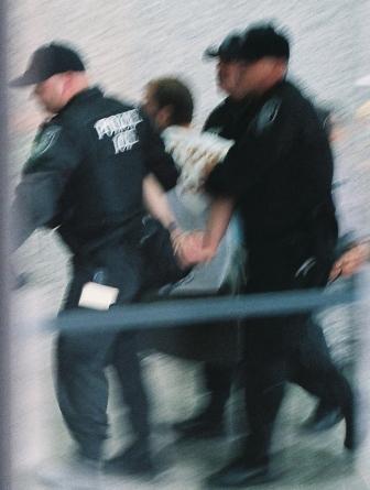 11. 3 agents, one protester