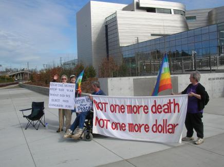 Some banners and signs at the road