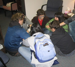 Students lock down inside Congressman David Price’s office, demanding an end to the U.S. occupation of Iraq.