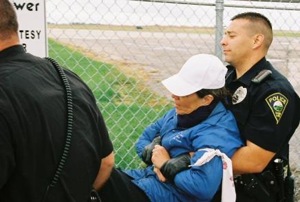 Janie Stein from Salina People for Peace Gets Carried Away After Crossing the Line