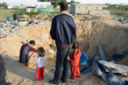 Walid al Nassasra Stands next to the Former Home of His Brother near Rafah: photo by Johnny Barber, From ImagesAttr