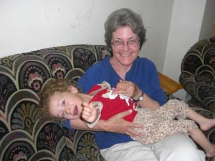 Cathy Breen with Iraqi Child in Syria