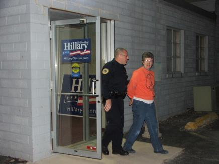 Chris Gaunt, 51 year-old Iowa farmer is led to jail after peacefully occupying Senator Hillary Clinton's Des Moines campaign office to protest her support of the Iraq war.