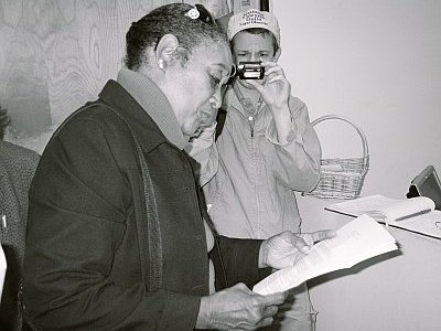 Barbara Walker, Silver Lake, reads a letter from a constituent (Devra Morice / Next Left Notes)