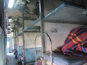 The Sleeper Cabin: Ali under colorful blankets