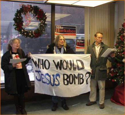 (left to right) Kathy Kelly, Mona Shaw, and Robert Braam were arrested in Huckabee’s Des Moines Campaign Headquarters.